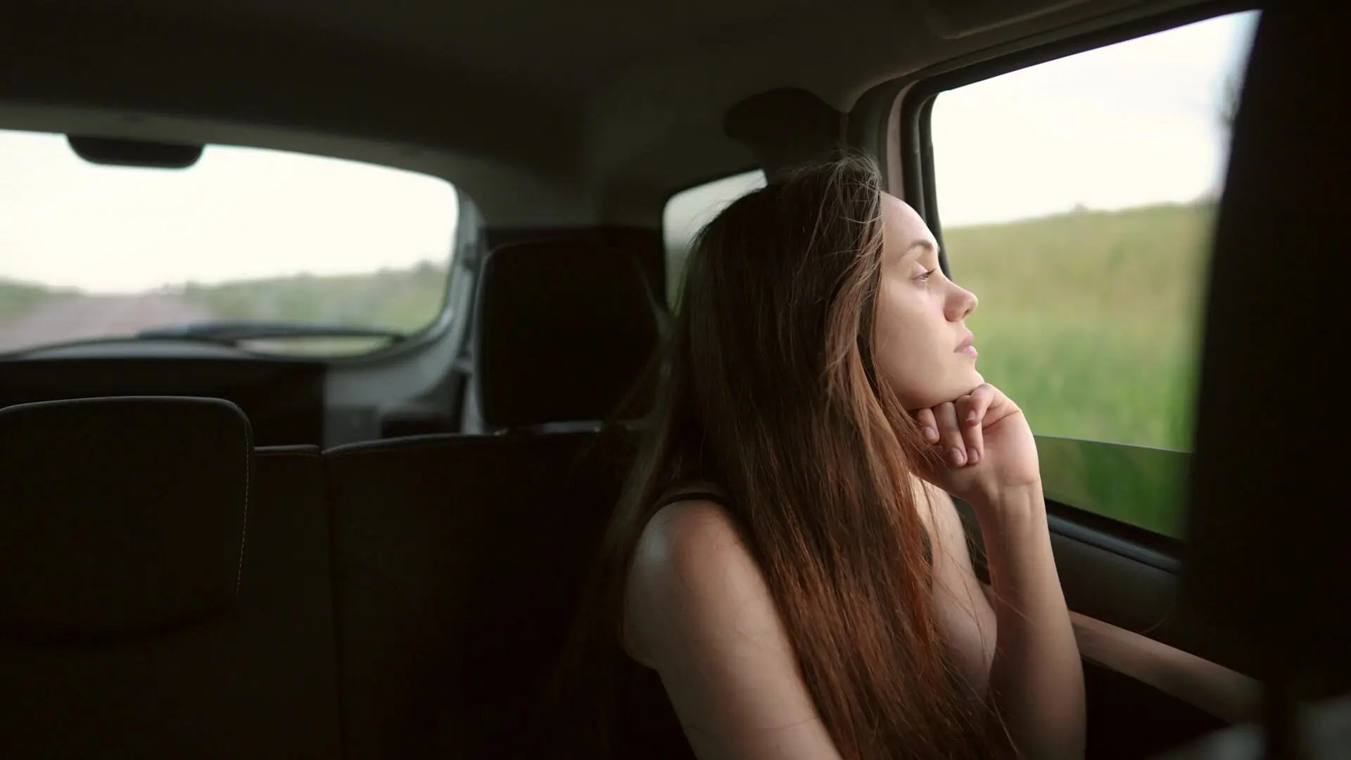 Travelling girl in a car